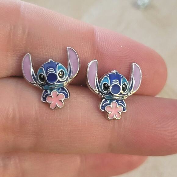 Stitch themed enamel post earrings with flower - Picture 1 of 1